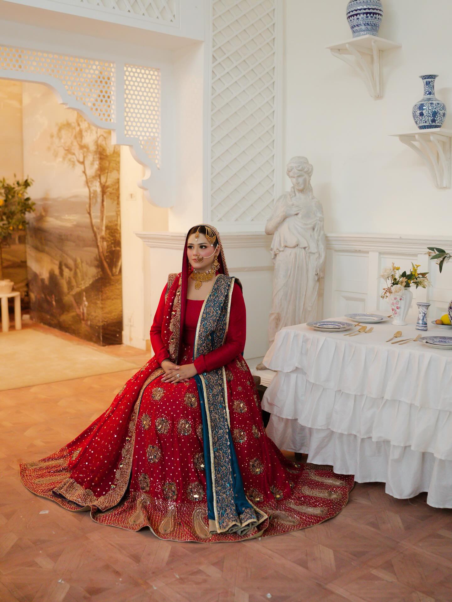 Noor-e-Jahan bridal lehenga in pomegranate red