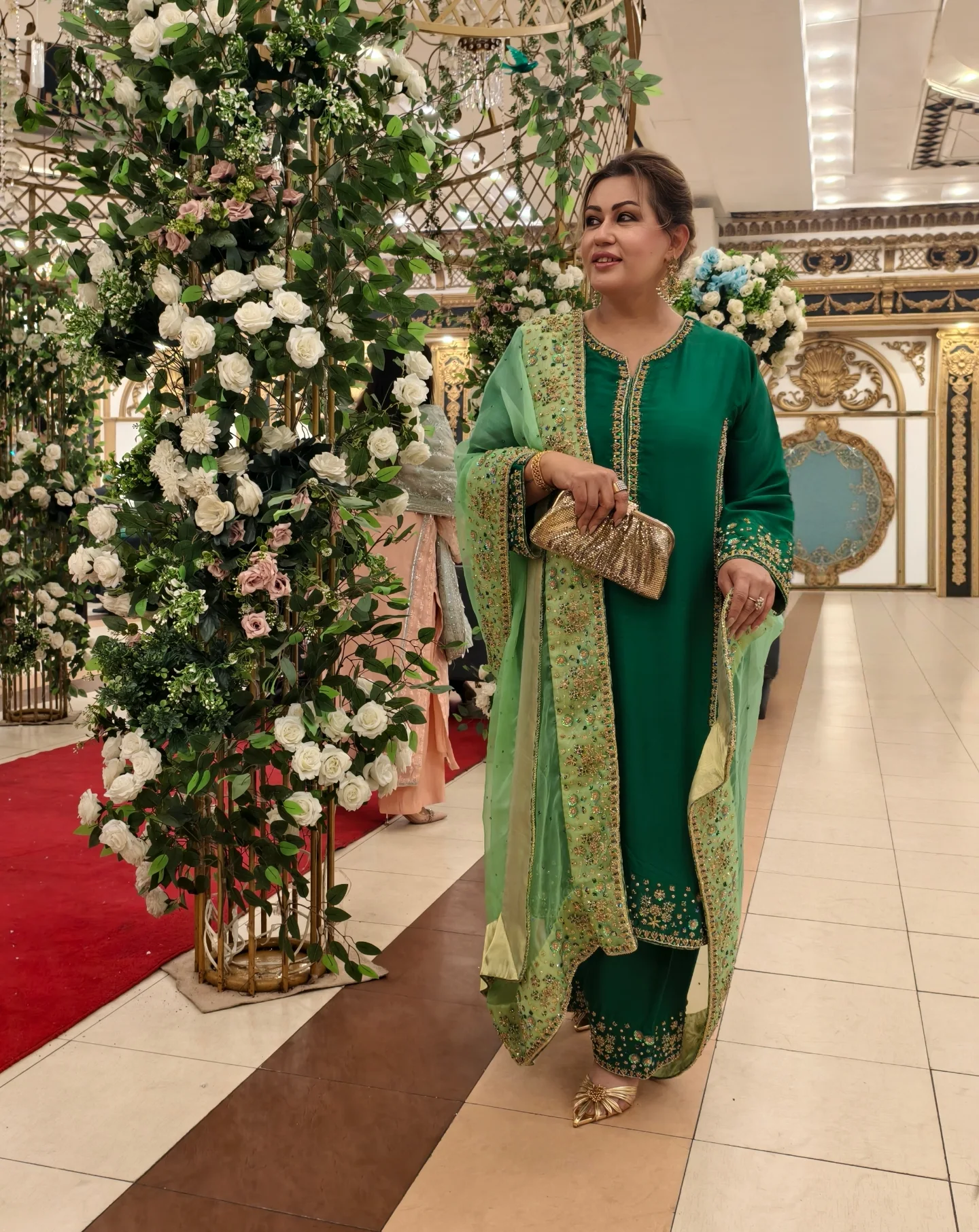 Sage from the Rangreza collection: emerald green embroidered suit